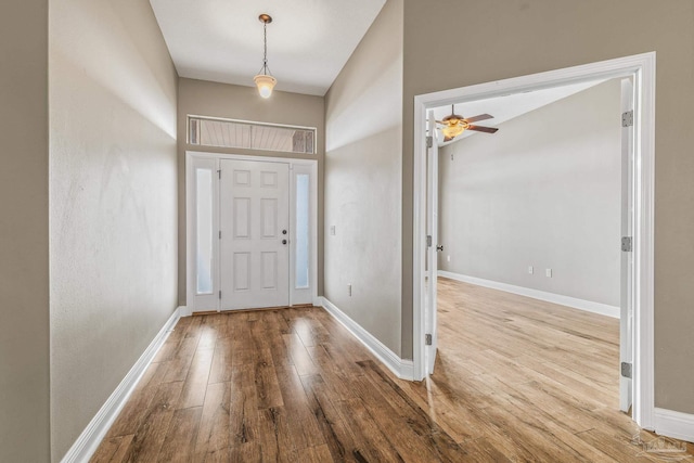 entryway featuring ceiling fan and light wood-type flooring