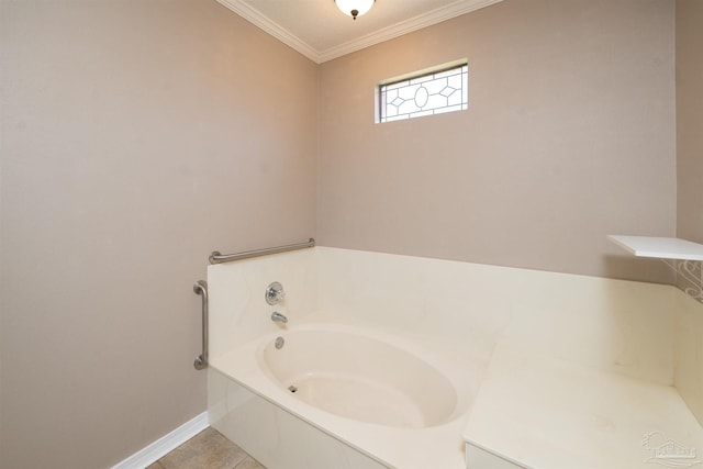 bathroom featuring a bathtub, crown molding, and tile patterned floors