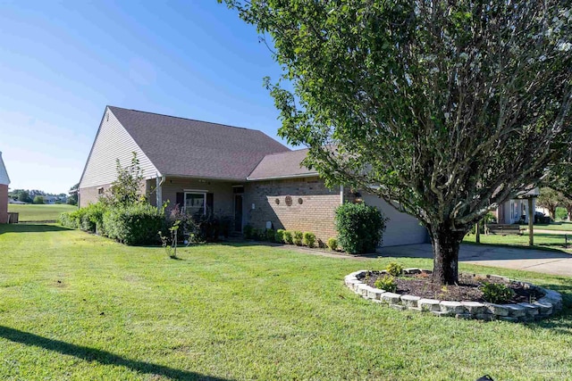 view of front of home with a front lawn