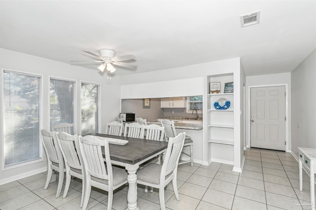 3382 Green Briar Cir, Gulf Breeze, FL 32563 - dining area with a ceiling fan and light tile patterned flooring