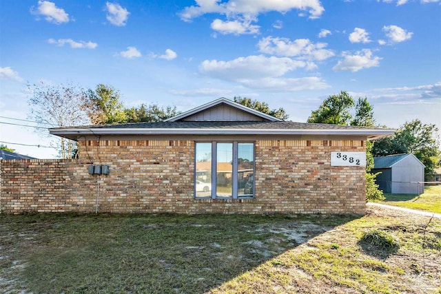 3382 Green Briar Cir, Gulf Breeze, FL 32563 - back of property with brick siding and a shingled roof