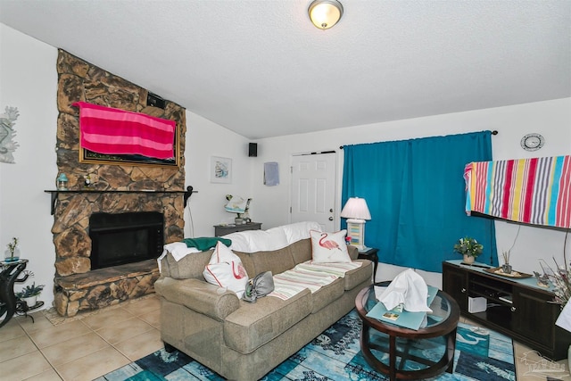 3382 Green Briar Cir, Gulf Breeze, FL 32563 - tiled living room featuring a fireplace, a textured ceiling, and lofted ceiling