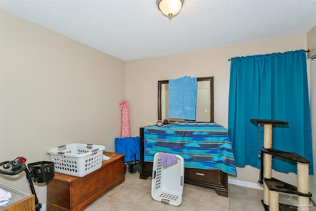 3382 Green Briar Cir, Gulf Breeze, FL 32563 - miscellaneous room featuring a textured ceiling and tile patterned flooring