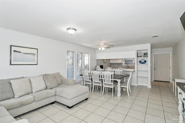 3382 Green Briar Cir, Gulf Breeze, FL 32563 - living area featuring light tile patterned flooring and a ceiling fan