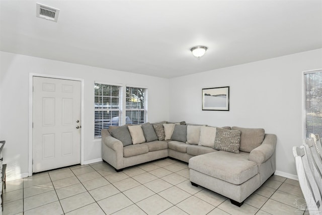 3382 Green Briar Cir, Gulf Breeze, FL 32563 - living area with light tile patterned flooring and plenty of natural light