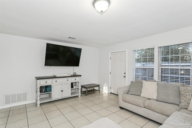 3382 Green Briar Cir, Gulf Breeze, FL 32563 - living room with light tile patterned floors and baseboards