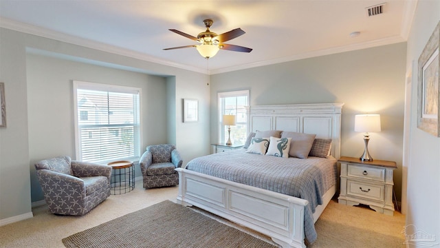 carpeted bedroom featuring ornamental molding, multiple windows, and ceiling fan