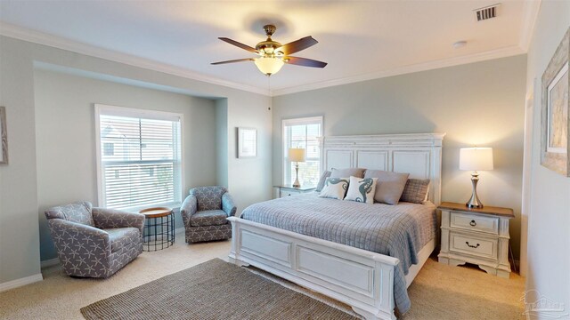 14379 Cordgrass Ln, Pensacola, FL 32507 - bedroom with light carpet, crown molding, baseboards, and visible vents