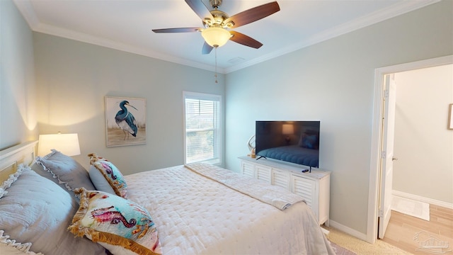 bedroom with ceiling fan, light hardwood / wood-style flooring, and ornamental molding