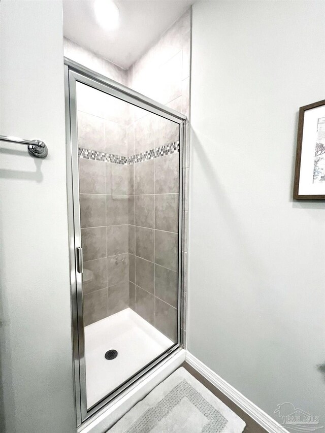 bathroom featuring walk in shower