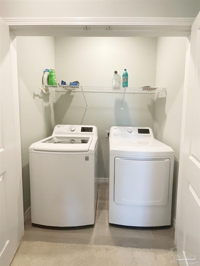 14379 Cordgrass Ln, Pensacola, FL 32507 - clothes washing area with washing machine and dryer and laundry area