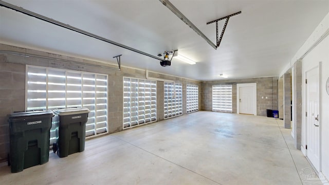 14379 Cordgrass Ln, Pensacola, FL 32507 - garage featuring a garage door opener