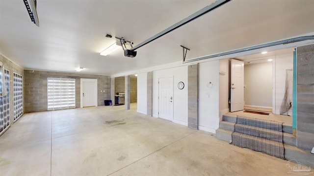 14379 Cordgrass Ln, Pensacola, FL 32507 - garage featuring a garage door opener