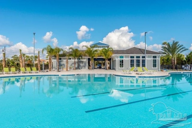 14379 Cordgrass Ln, Pensacola, FL 32507 - pool featuring a patio area and fence