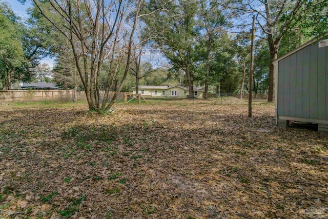 view of yard with fence