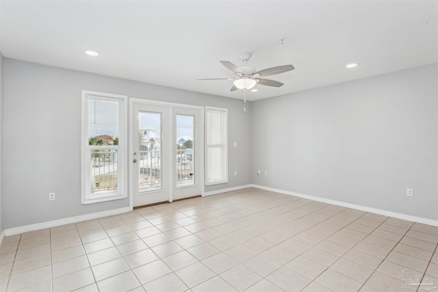 unfurnished room with ceiling fan