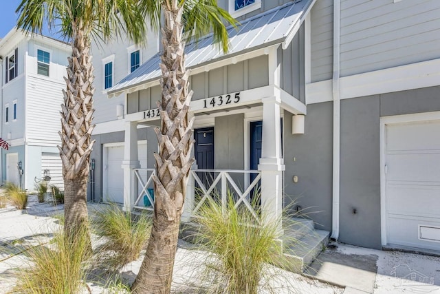 property entrance featuring a garage