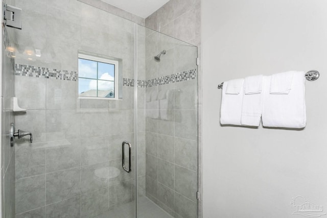 bathroom featuring an enclosed shower