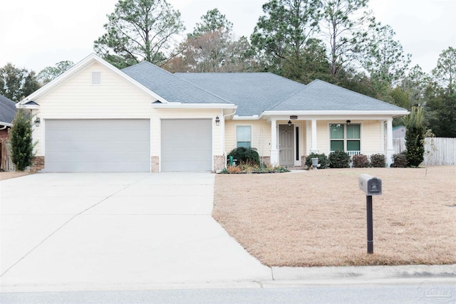 ranch-style house featuring a garage