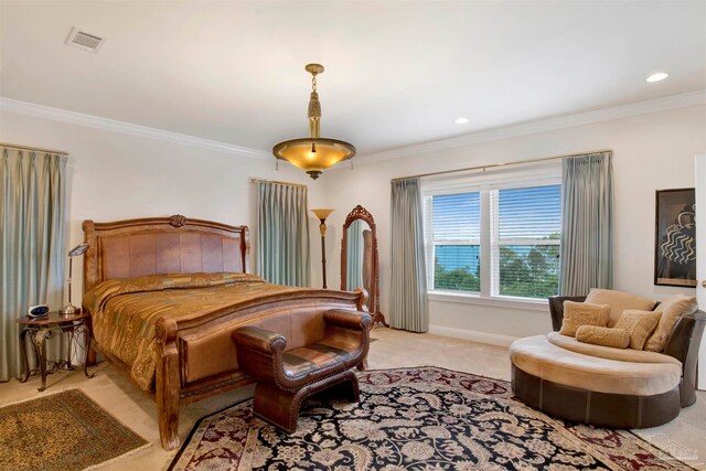 bedroom with crown molding and light carpet