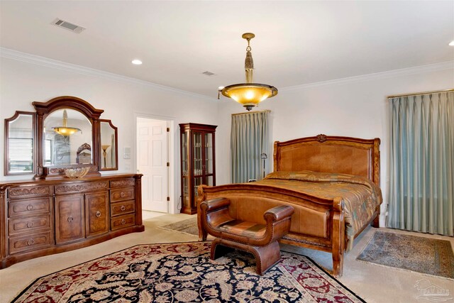 carpeted bedroom featuring ornamental molding