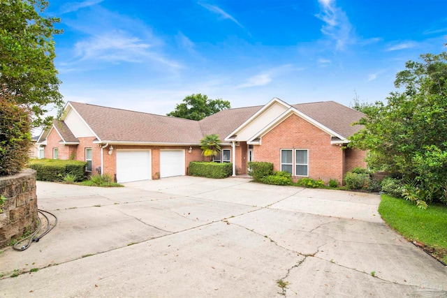 single story home featuring a garage