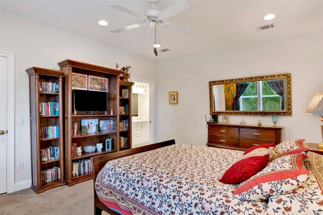 bedroom featuring light colored carpet and ceiling fan