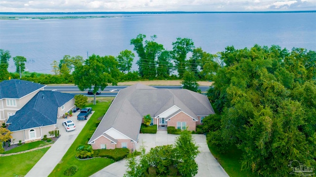 birds eye view of property featuring a water view