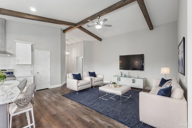 living room with lofted ceiling with beams, dark hardwood / wood-style floors, and ceiling fan