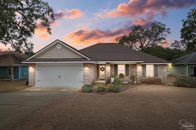 view of front of home with a garage