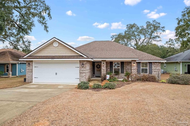 ranch-style house featuring a garage