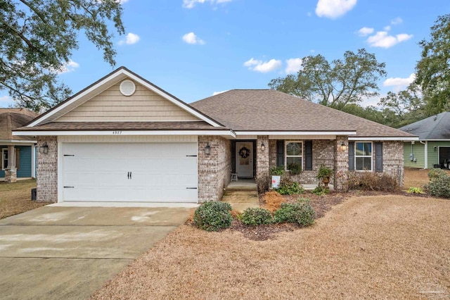 ranch-style house featuring a garage