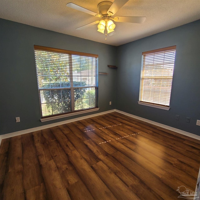 unfurnished room with a textured ceiling, ceiling fan, and hardwood / wood-style flooring