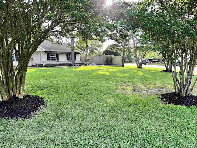 1405 College Pkwy, Gulf Breeze, FL 32563 - view of yard featuring fence