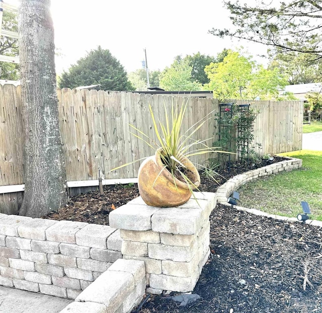 1405 College Pkwy, Gulf Breeze, FL 32563 - view of yard featuring a fenced backyard