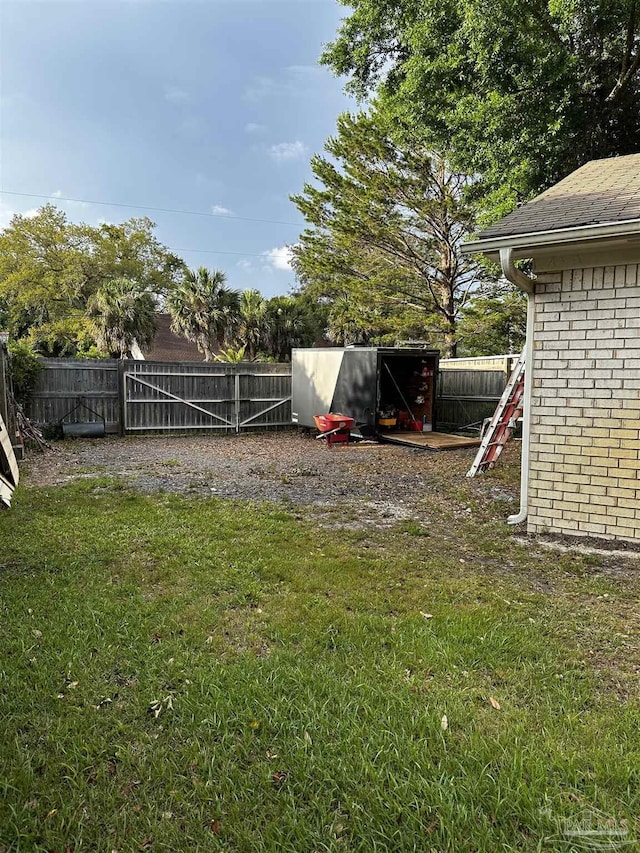 1405 College Pkwy, Gulf Breeze, FL 32563 - view of yard featuring a fenced backyard