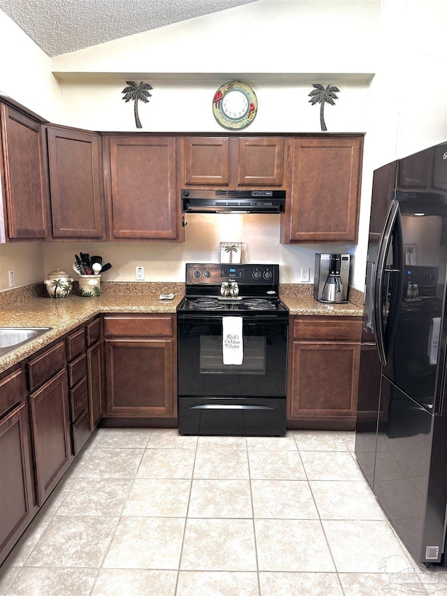 1405 College Pkwy, Gulf Breeze, FL 32563 - kitchen featuring a textured ceiling, ventilation hood, a sink, light tile patterned floors, and black appliances