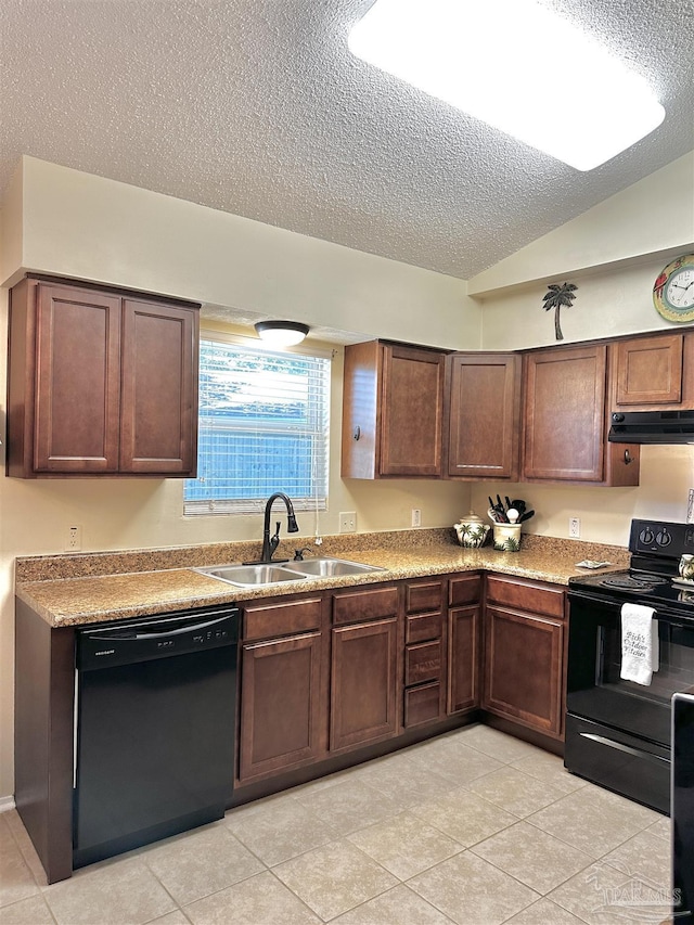 1405 College Pkwy, Gulf Breeze, FL 32563 - kitchen featuring a textured ceiling, under cabinet range hood, a sink, light tile patterned floors, and black appliances
