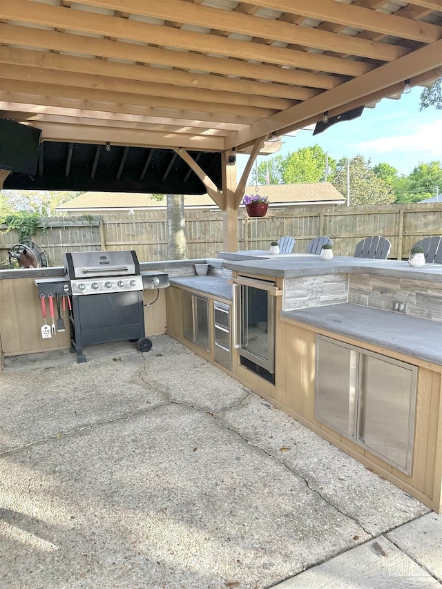1405 College Pkwy, Gulf Breeze, FL 32563 - view of patio / terrace featuring a fenced backyard, area for grilling, and a grill