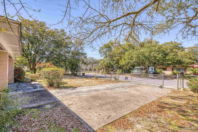 view of yard featuring a gate and fence