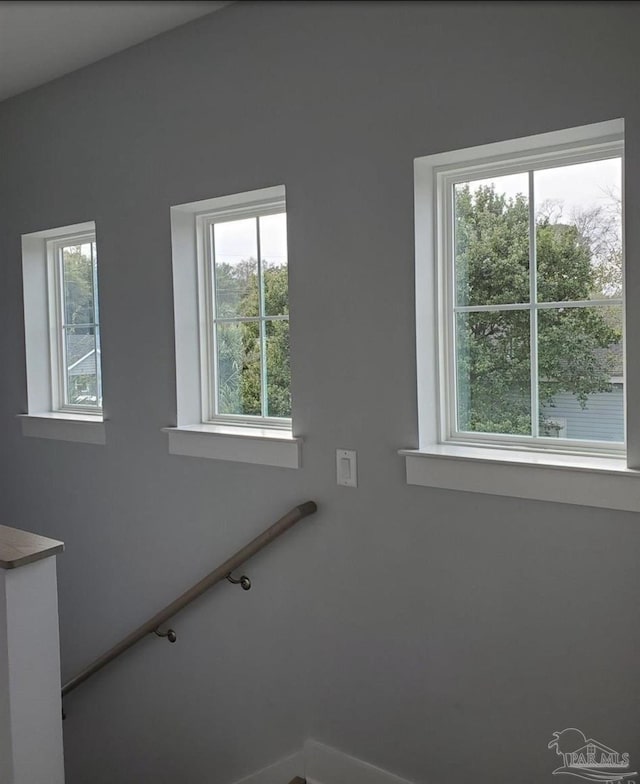 stairs featuring a wealth of natural light
