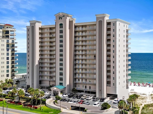 view of building exterior with a water view