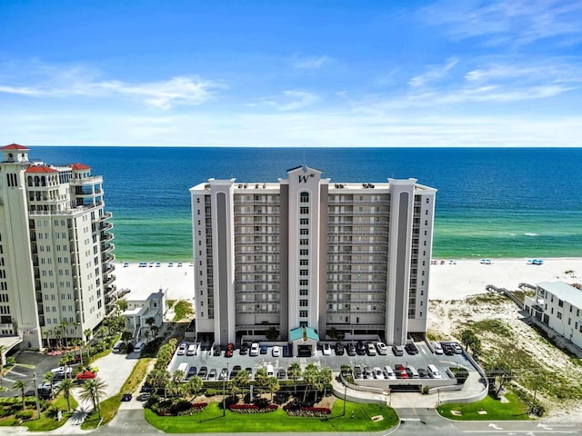 bird's eye view featuring a beach view and a water view