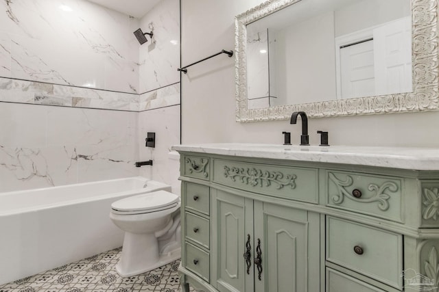 full bathroom featuring toilet, tiled shower / bath combo, and vanity