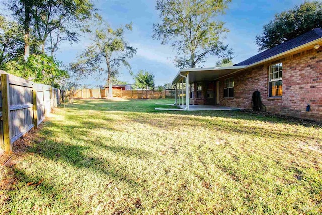 view of yard featuring a patio area