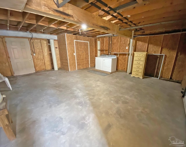 basement with washing machine and dryer