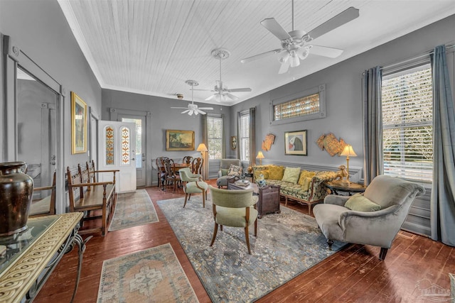 living room with ceiling fan, wooden ceiling, dark hardwood / wood-style floors, and ornamental molding