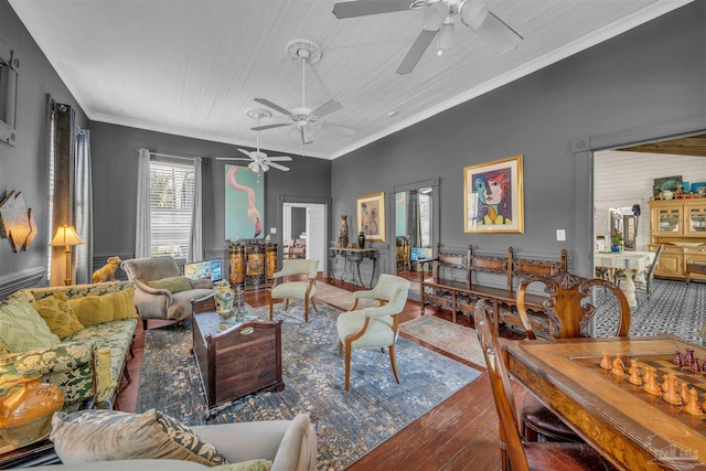 living room featuring hardwood / wood-style floors and ornamental molding