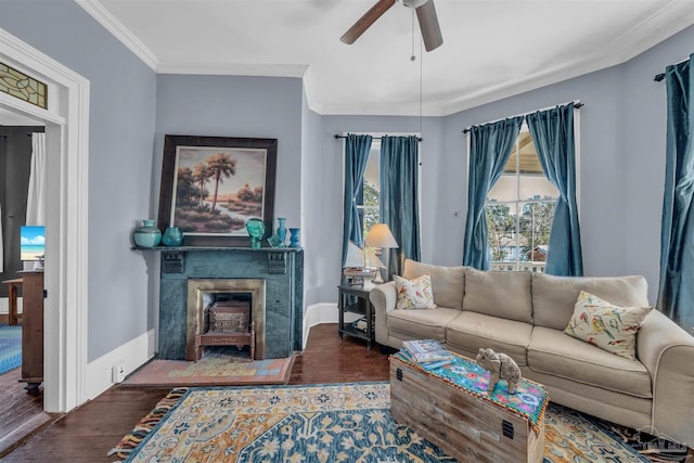 living room featuring ceiling fan, dark hardwood / wood-style floors, and ornamental molding