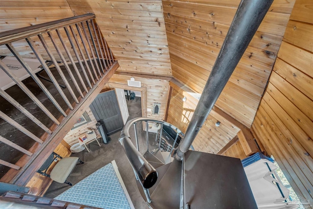 interior space with wooden walls and carpet